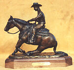 Slide Show - bronze by sculptor Susan Lynes